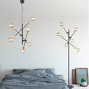 Cross pendant light with a minimalist design