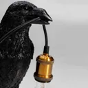 KARE Animal Crow table lamp in the shape of a crow