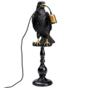 KARE Animal Sitting Crow table lamp in black