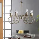 8-bulb Marnia chandelier in antique brass