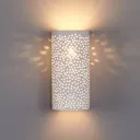 Perforated wall light Jiru made of white plaster
