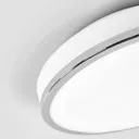 Round LED ceiling lamp Lyss with chrome frame IP44