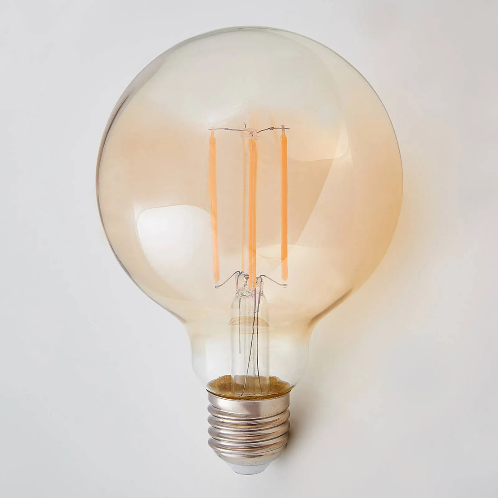 E27 LED globe filament bulb 6W 500lm, amber 2,200K