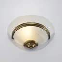 Irimia glass wall light, antique brass