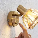 Lindby Kosta wall light with switch, brass