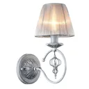 Monsoon wall light with a grey organza lampshade