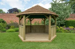 Forest Hexagonal Thatched Roof Gazebo with Cream Lining 4m Treated Timber (Installed)