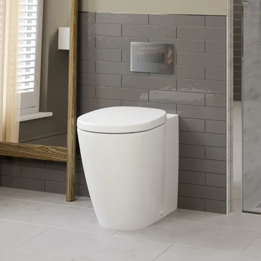 Ideal Standard Concept Freedom comfort height back to wall toilet with soft close seat