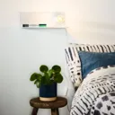 Sebo - white metal wall light with a shelf