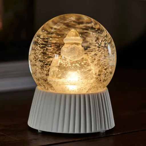 Santa LED snow globe with a snowfall effect