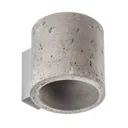 Ara wall light as a concrete cylinder